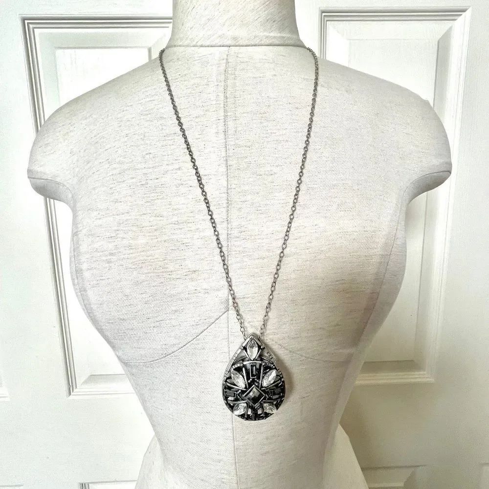 Long silver tone rhinestone teardrop pendant necklace